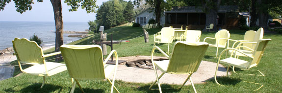 Sitting around the fire is one of the favorite things to do here. This is an image of our vintage yellow metal chairs around the community fire pit.